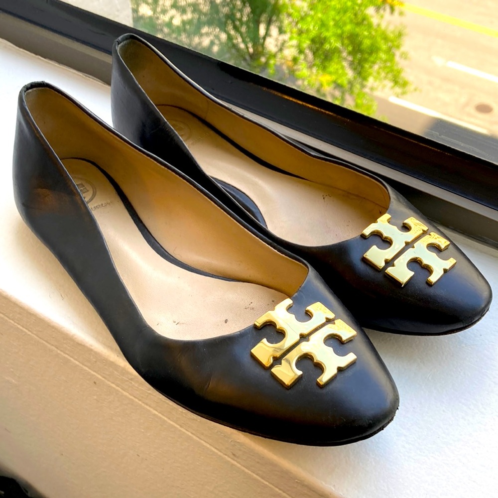 Black Tory Burch flats with gold emblem